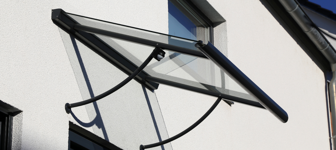 black and glass door canopy